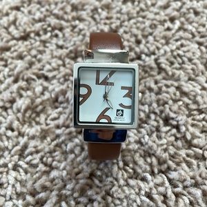 Never worn. Cute watch with magnetic closure.